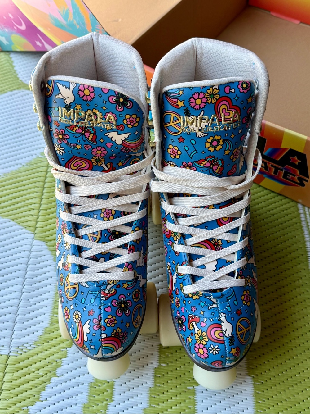 Impala Roller Skates - Blue Peace & Flower Graphic